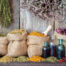 Healing botanicals, herbs, & oils in hessian bags